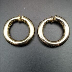 Clip on iced gold tone earrings. E0136